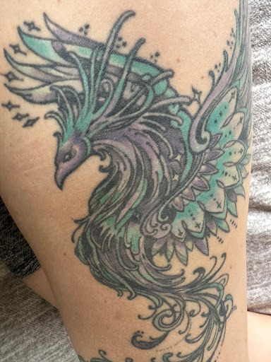 Explore rib tattoo ideas for women, creative tattoo ideas in North Conway, available at Ampersand Tattoo