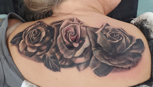 Explore blue october tattoo ideas, creative tattoo ideas in Saint Paul, available at Iron Rhino Tattoo