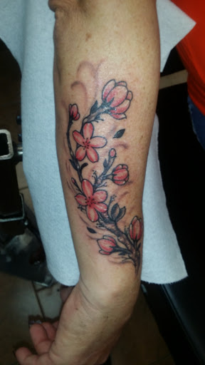 Explore female face tattoo ideas, creative tattoo ideas in Sullivan, available at Square Rose Tattoo & Piercing