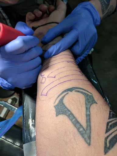 Explore arch angel tattoo ideas, creative tattoo ideas in Waverly, available at Twisted Fate Tattoos