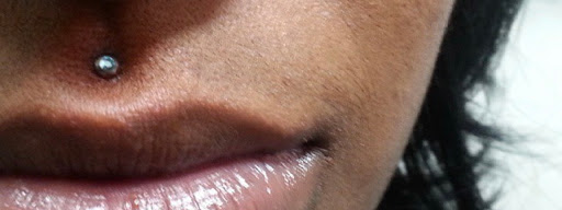 Explore spine tattoo ideas for females, creative tattoo ideas in Milwaukee, available at Piercings Plus