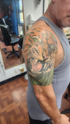 Explore lady bug tattoo ideas, creative tattoo ideas in Aurora, available at Skin of A Different Color