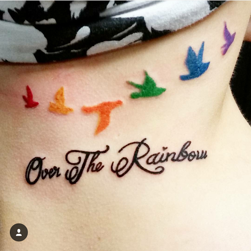 Explore spine tattoo ideas for females, creative tattoo ideas in Erie, available at EliKingInk