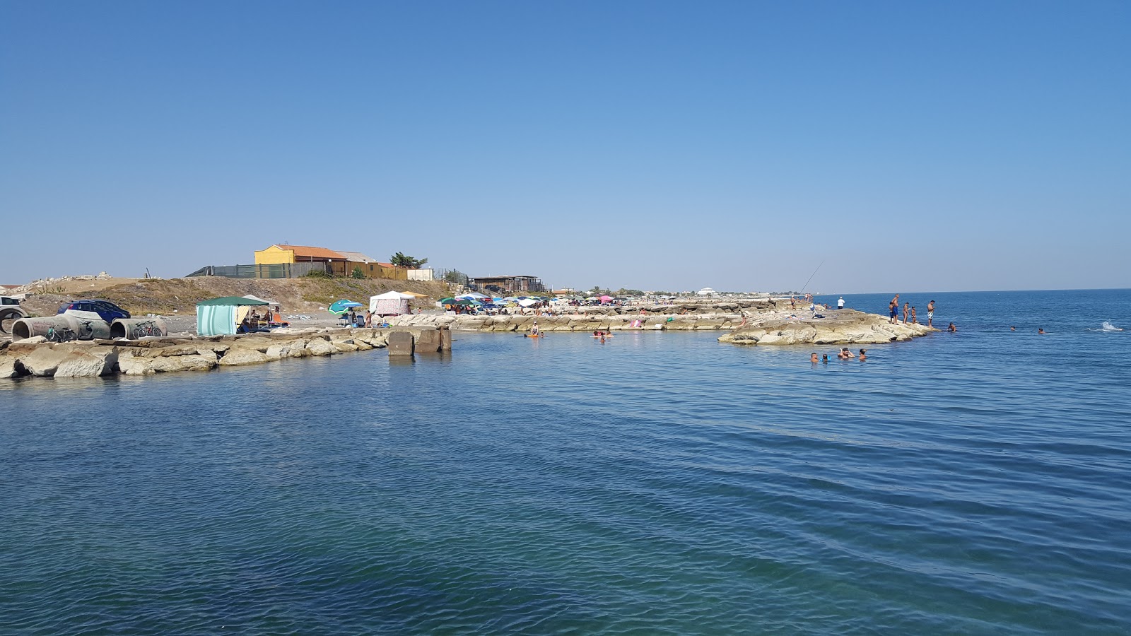 Foto von Spiaggia Orno Margherita di Savoia mit grauer sand Oberfläche