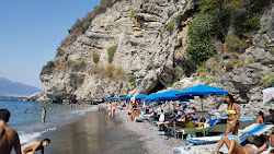 Foto von La Tartaruga beach mit kleine bucht