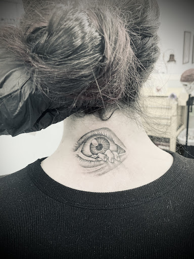 Explore tattoo ideas neck, creative tattoo ideas in Ocala, available at Beauty in a Canvas Tattoo and Art Gallery