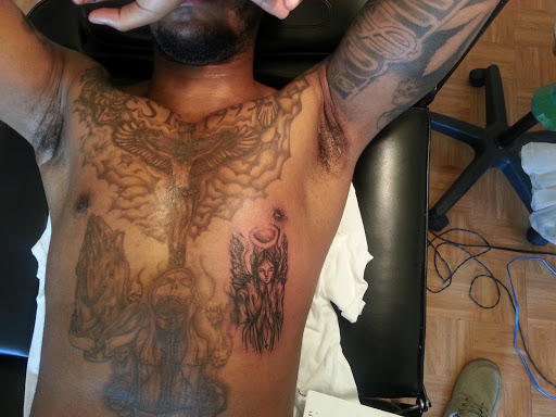 Explore broken clock tattoo ideas, creative tattoo ideas in Whitehall, available at Beachside Tattoos & Smoke Shop