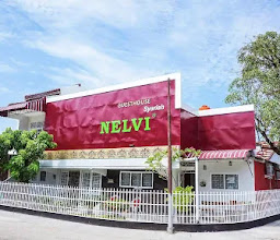 OYO 433 Nelvi Guest House Syariah photo
