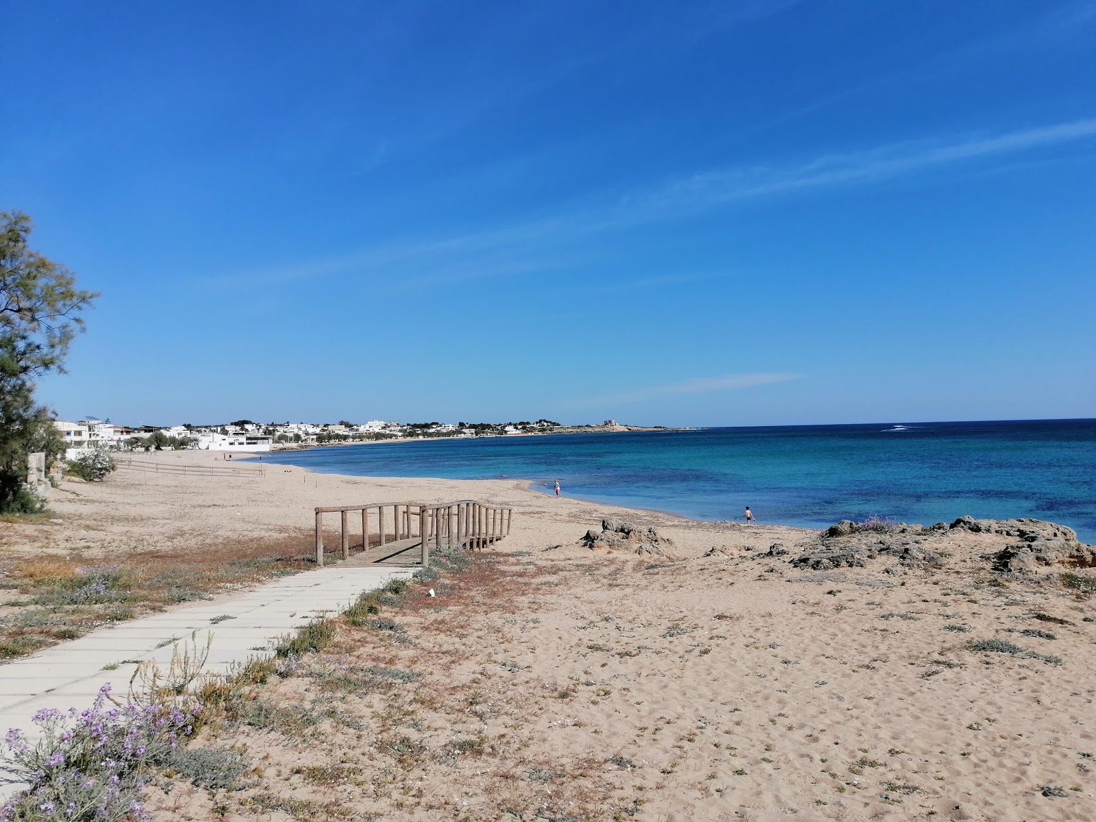 Foto von Torre Ovo Beach - beliebter Ort unter Entspannungskennern