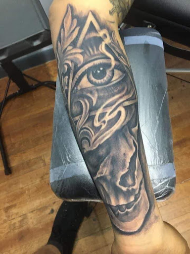 Explore lab tattoo ideas, creative tattoo ideas in Hudson, available at Twisted Canvas Tattoo and Art Studio