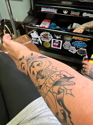 Explore bottom sleeve tattoo ideas, creative tattoo ideas in Kansas City, available at Landlocked Tattoo & Piercing LLC