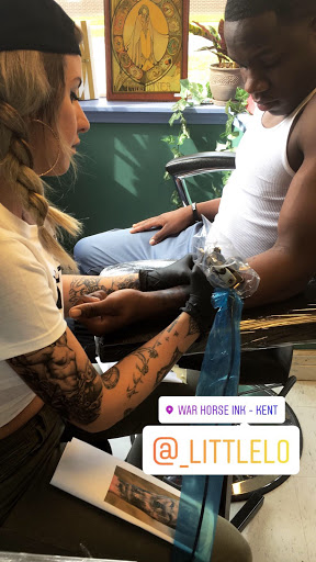 Explore black mamba tattoo ideas, creative tattoo ideas in Kent, available at War Horse Ink