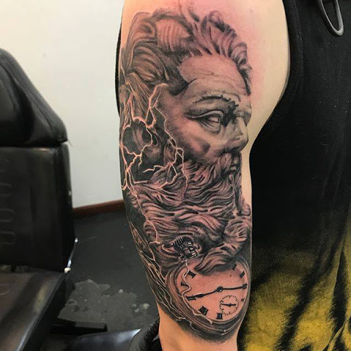 Explore racoon tattoo ideas, creative tattoo ideas in Modesto, available at Emerald Tattoo & Piercing - Modesto