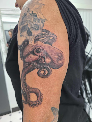 Explore female arm sleeve tattoo ideas, creative tattoo ideas in Pahrump, available at Social Suicide Tattoos