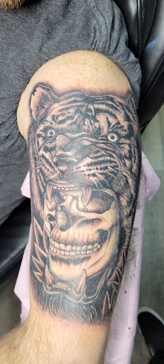 Find tattoo ideas for mom for your next unique tattoo in Lima at White Wizard Tattoo & Body Piercing