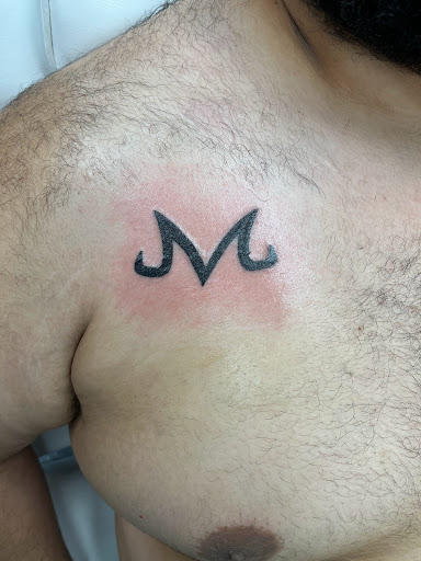 Explore mens script tattoo ideas, creative tattoo ideas in La Vista, available at InkedUp Needles