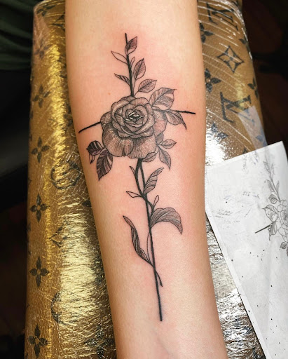 Explore daisy tattoo ideas, creative tattoo ideas in Pineville, available at Epic Ink Studio