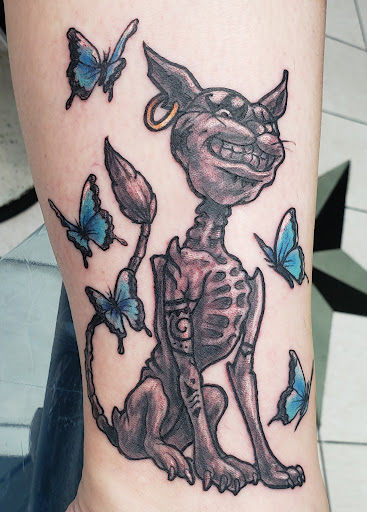 Explore ideas for spine tattoos, creative tattoo ideas in Hampton, available at Blue Horseshoe Tattoo and Body Piercing