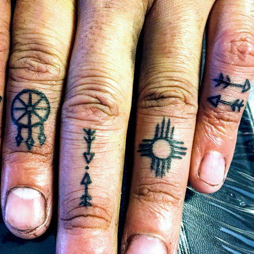 Explore february birth flower tattoo ideas, creative tattoo ideas in San Angelo, available at A1 Tattoos and Piercings