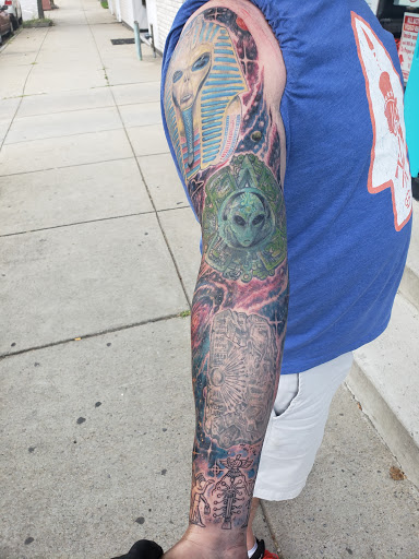 Explore life and death sleeve tattoo ideas, creative tattoo ideas in Buffalo, available at Madd Ink Tattoo & Piercing