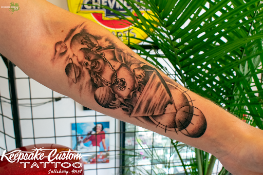 Explore tattoo back cover up ideas, creative tattoo ideas in Salisbury, available at Keepsake Custom Tattoo & Body Piercing Laser Tattoo Removal