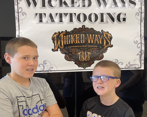 Explore dark romance book tattoo ideas, creative tattoo ideas in Grandville, available at Wicked Ways Tattooing