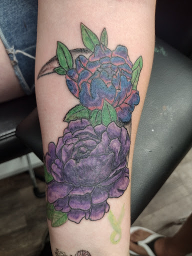 Explore fine line tattoo ideas for females, creative tattoo ideas in Muscatine, available at The Sapphire Lounge