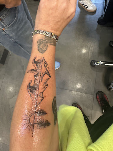 Explore minimalist dog tattoo ideas, creative tattoo ideas in San Francisco, available at Cleopatra INK Tattoo & Piercing San Francisco Studio