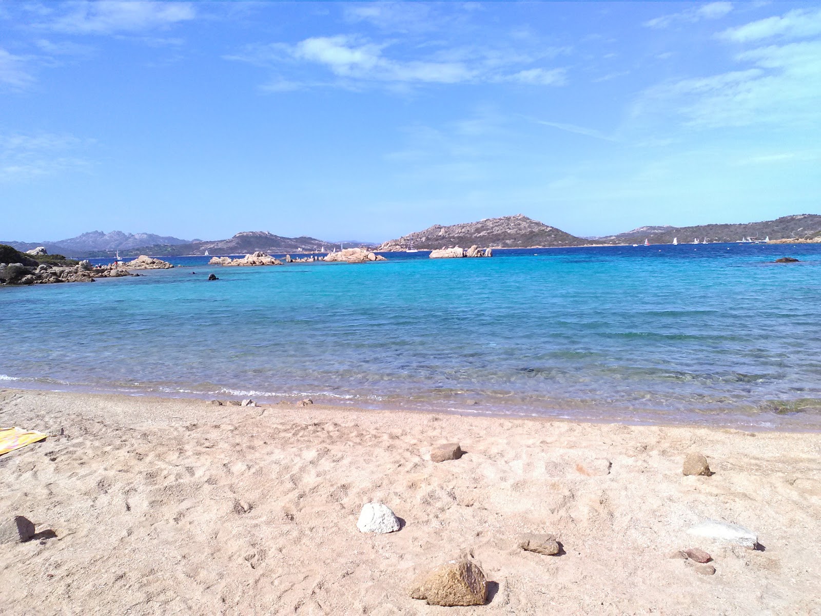 Photo of Porto Palma beach with partly clean level of cleanliness