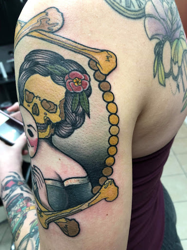 Explore love music tattoo ideas, creative tattoo ideas in Crestview, available at Tommy Gunns Tattoo