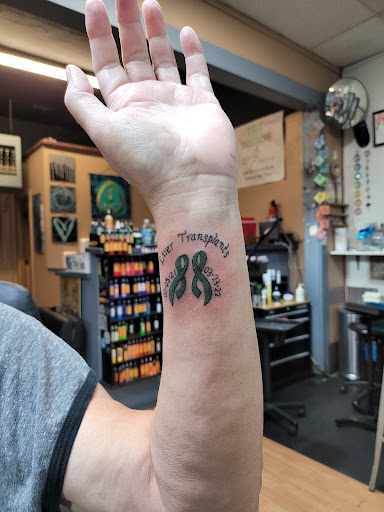 Explore cover up tattoo ideas for upper back, creative tattoo ideas in Tooele, available at Tattoos on Vine