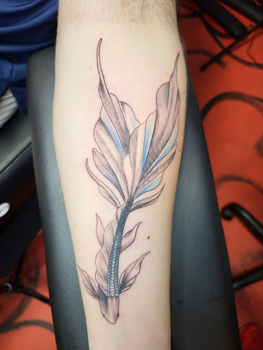 Explore enlightenment tattoo ideas, creative tattoo ideas in Stuart, available at Kenny Tats Inkcorporated