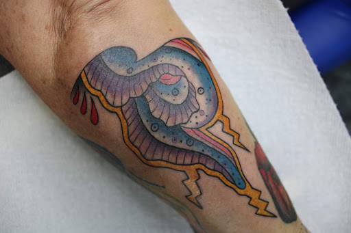 Explore arm ditch tattoo ideas, creative tattoo ideas in Mason City, available at Soulless Tattoo Collective