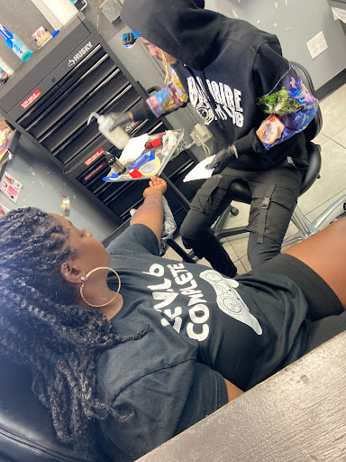 Find lion hand tattoo ideas for men for your next unique tattoo in Louisville at Zoes Tattoos & Piercings