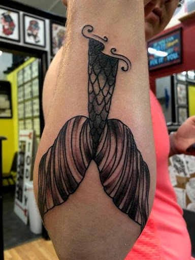 Explore lifeguard tattoo ideas, creative tattoo ideas in Erie, available at 76 Tattoo