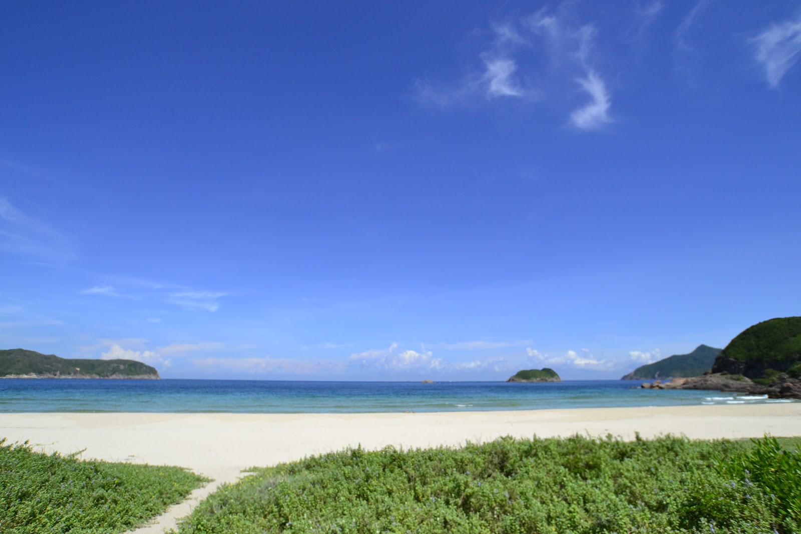 Photo of Tai Wan with turquoise water surface