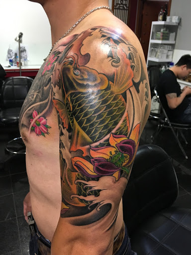 Find crow tattoo ideas for your next unique tattoo in Flushing at 7 Train Tattoo Studio Inc
