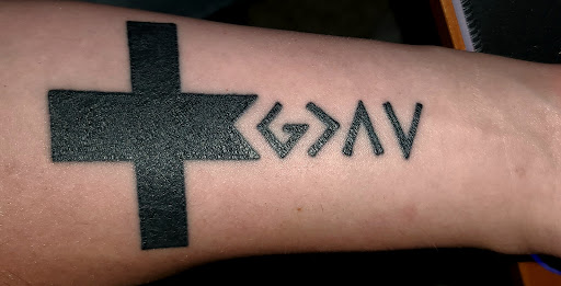 Find mens skull tattoo ideas for your next unique tattoo in Avon at Avanti Tattoo