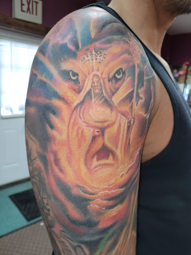 Explore rebel tattoo ideas, creative tattoo ideas in Angola, available at Hoodlum Ink