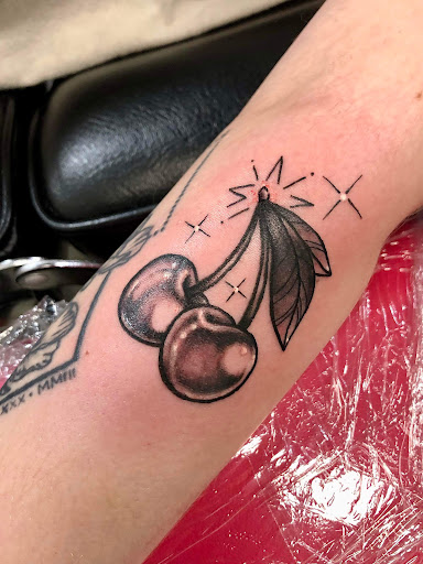 Explore lady bug tattoo ideas, creative tattoo ideas in Rowlett, available at Fresh Image Tattoo Studios