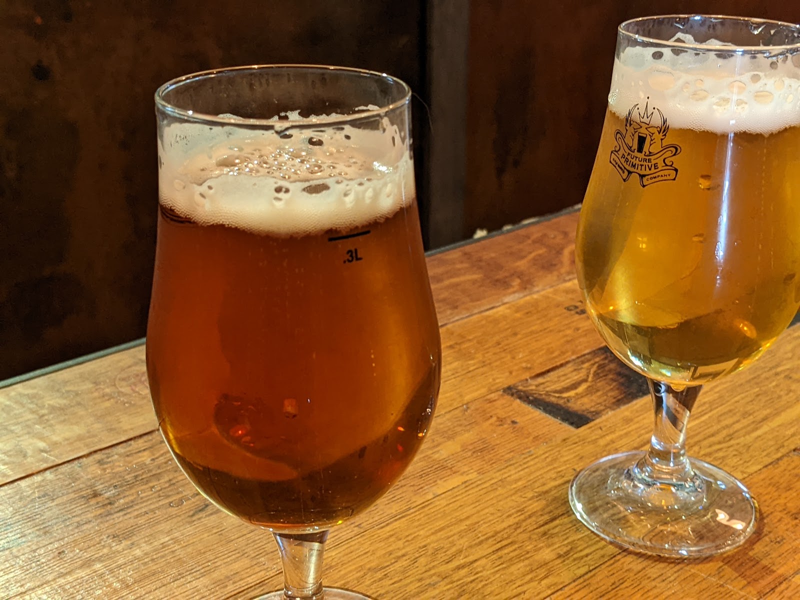 A pint of beer on a bar