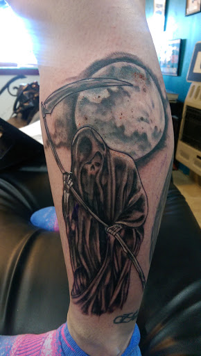 Explore cover up tattoo ideas on arm, creative tattoo ideas in East Windsor, available at AAA Tattoo