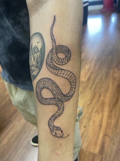 Explore half of sleeve tattoo ideas, creative tattoo ideas in Cocoa, available at Rorschach Tattoo Shop and Piercing Studio