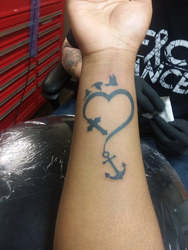 Explore chicano art tattoo ideas, creative tattoo ideas in Foley, available at Black Sheep Custom Tattoos and Piercings