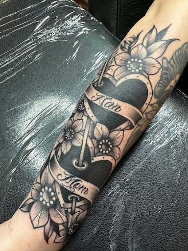 Explore black and grey tattoos sleeves ideas, creative tattoo ideas in Wharton, available at Executioner Tattoo