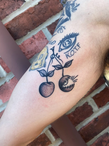 Explore wine tattoo ideas, creative tattoo ideas in Glenside, available at Yellow Rose Tattoo