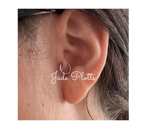 Explore spine tattoo ideas for women, creative tattoo ideas in Lewisburg, available at Jolie Femme Permanent Makeup & Tiny Tattoos