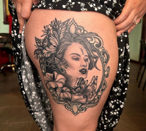 Explore solar eclipse tattoo ideas, creative tattoo ideas in Cleveland, available at Vanaheim Tattoo and Piercing Studio