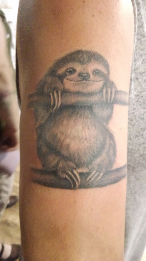 Explore family crest tattoo ideas, creative tattoo ideas in Virginia Beach, available at World Famous Blue Horseshoe Tattoo and Piercing Independence