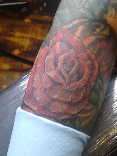 Explore jaguar tattoo ideas, creative tattoo ideas in Chester, available at Anchored Arms Custom Tattoo